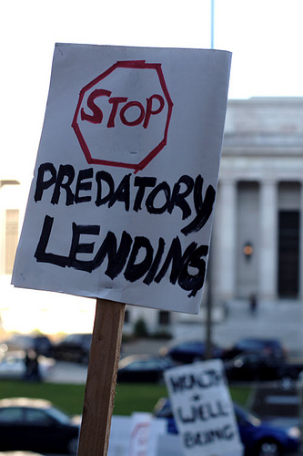 stop predatory lending sign